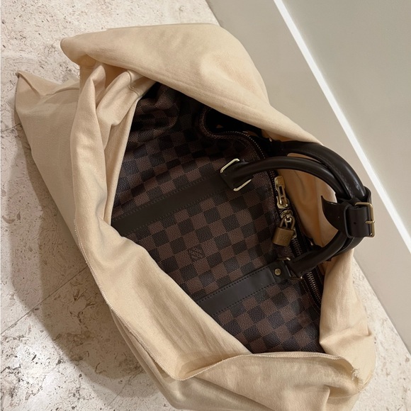 Louis Vuitton keepall 50 travel bag in ebene damier canvas and brown leather. - Picture 7 of 9
